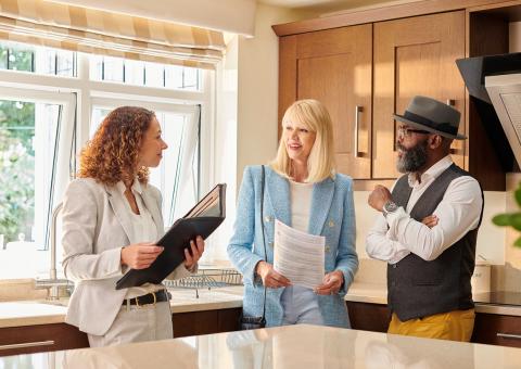 Agent, adjuster and homeowner satisfied 